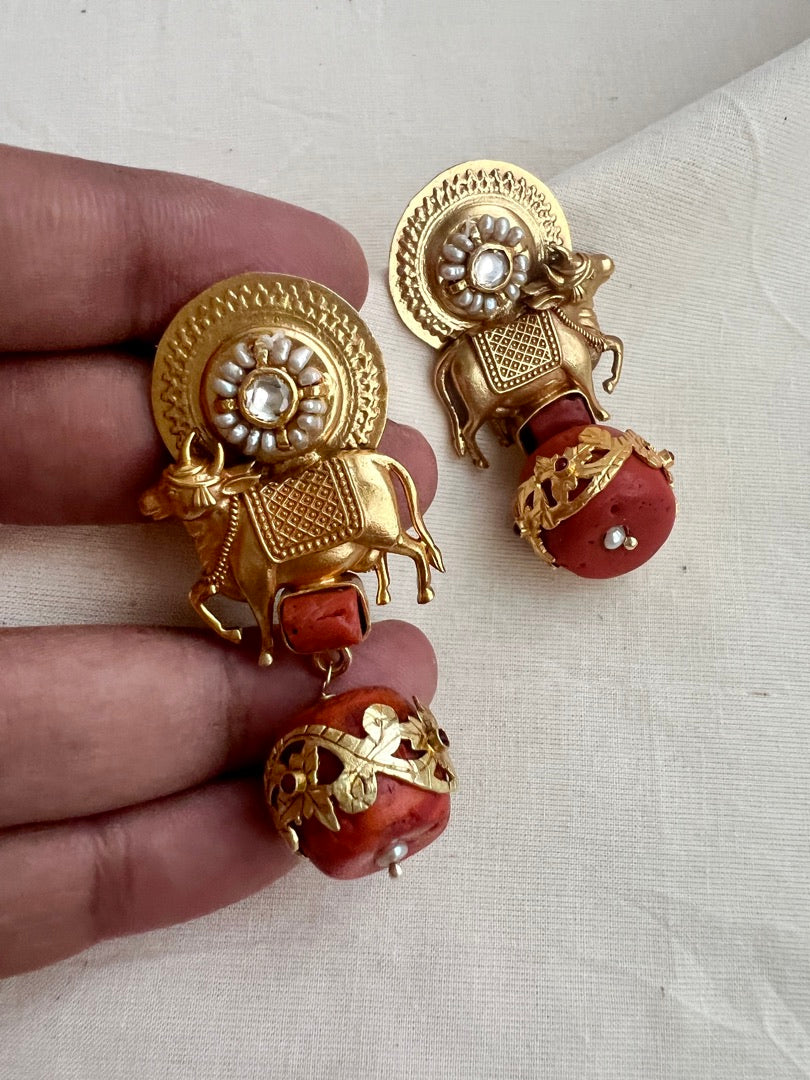 Gold polish cow motif earrings with coral bead hangings-Earrings-CI-House of Taamara