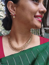 Gold polish peacock motif studs with pearls-Earrings-CI-House of Taamara