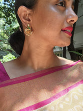 Green kundan peacock earrings with pearls around-Earrings-PL-House of Taamara