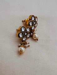 Gold polish kundan flower studs with pearls