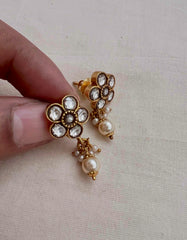 Gold polish kundan flower studs with pearls