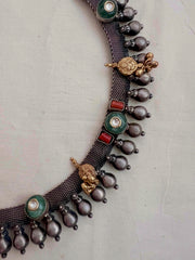 Dual tone necklace with kundan, coral and nakash motif