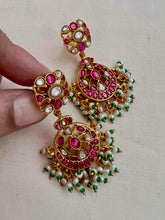 Gold polish kundan, ruby and emerald hangings with pearls