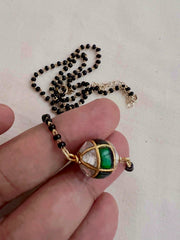 Mangalsutra style black bead chain with kundan & emerald bead pendant