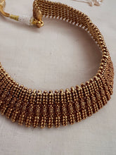 Antique gold polish choker
