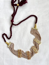 Gold polish stringed pearls choker