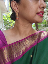 Vintage style earrings with coral