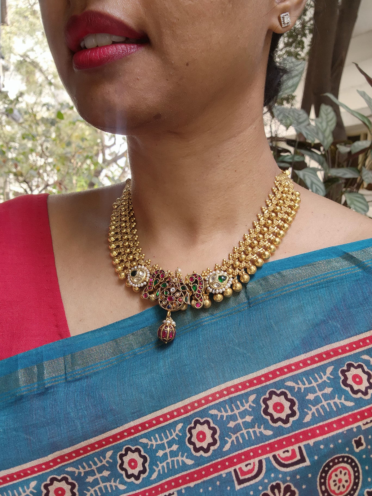 Gold polish fusion necklace with navrathana, ruby & emerald kundan with pearls