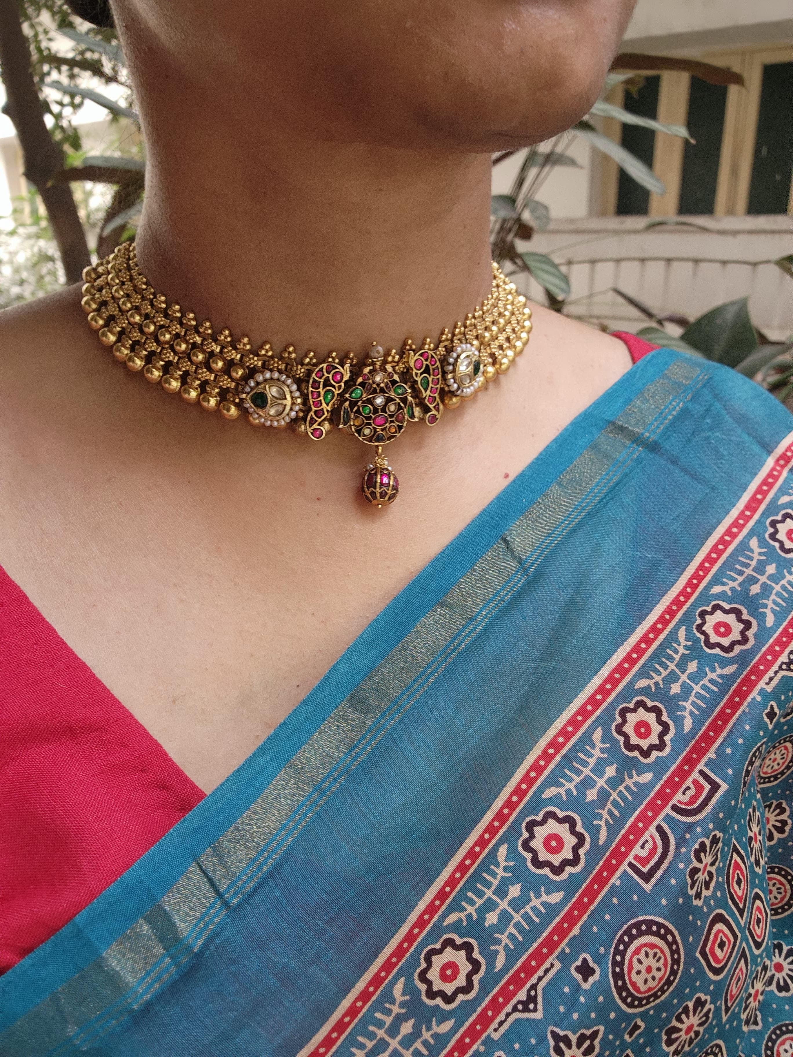 Gold polish fusion necklace with navrathana, ruby & emerald kundan with pearls