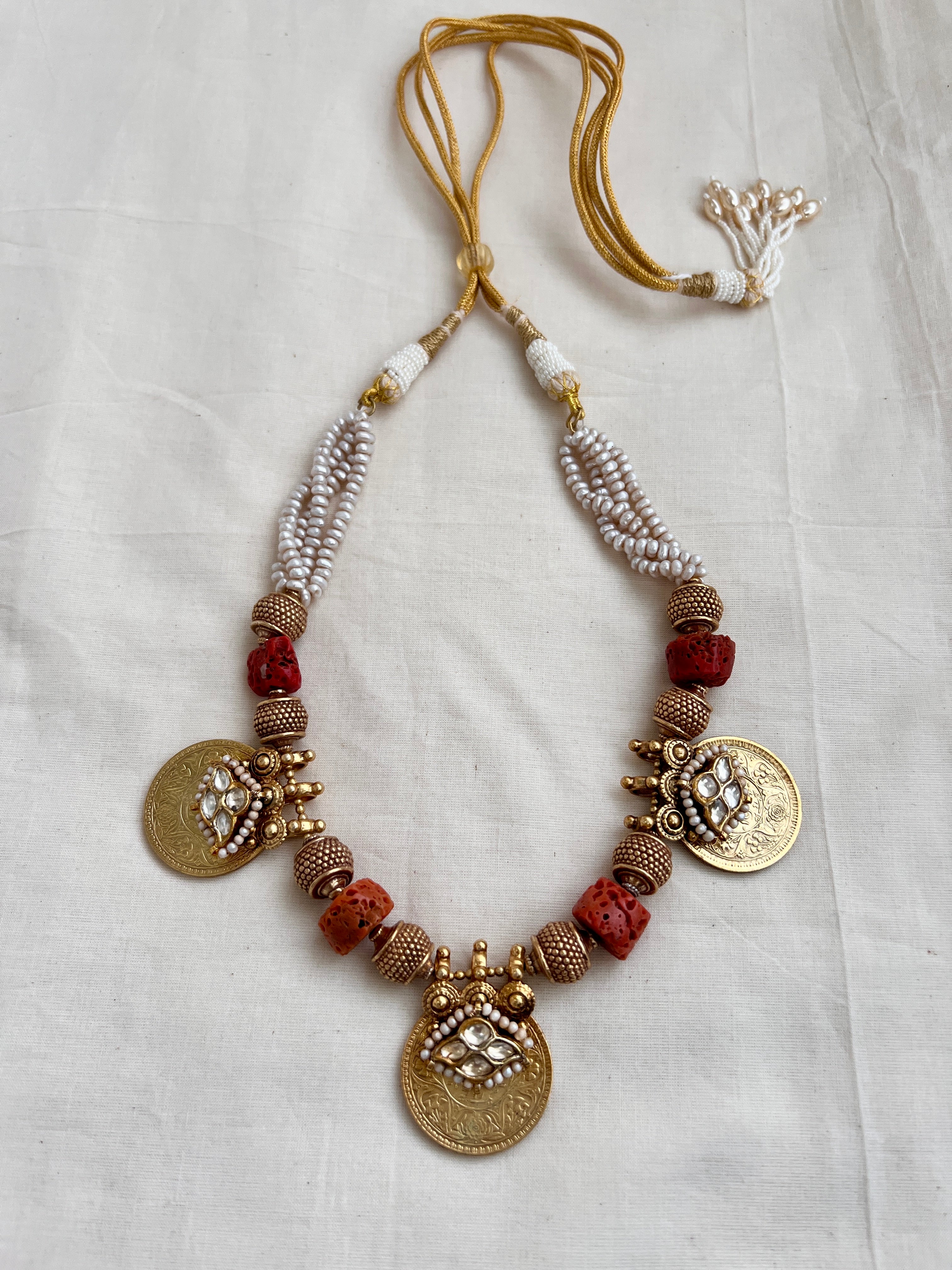 Antique gold polish coral beads with kundan motifs on coin pendant & pearls-Silver Neckpiece-CI-House of Taamara