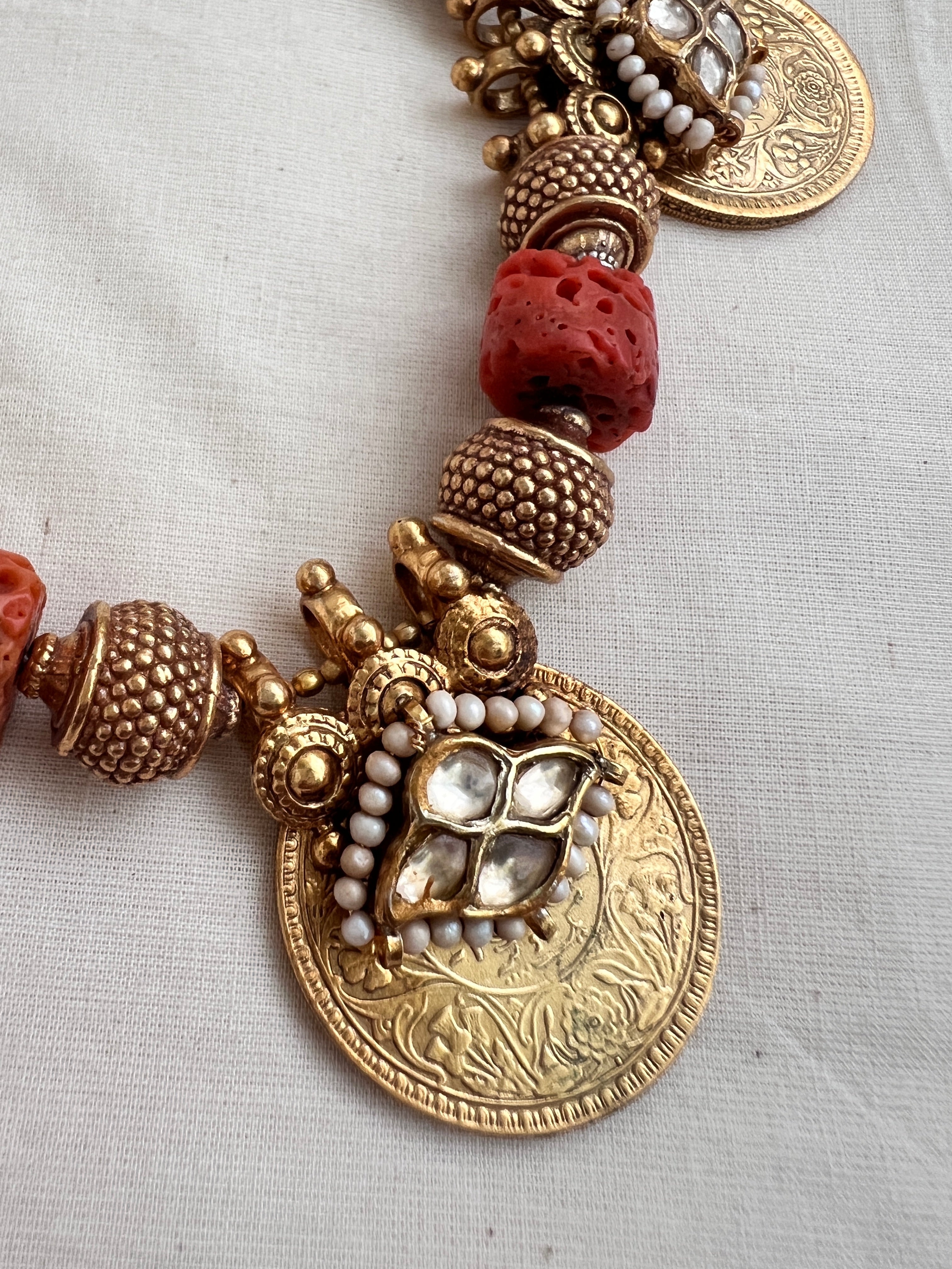 Antique gold polish coral beads with kundan motifs on coin pendant & pearls-Silver Neckpiece-CI-House of Taamara