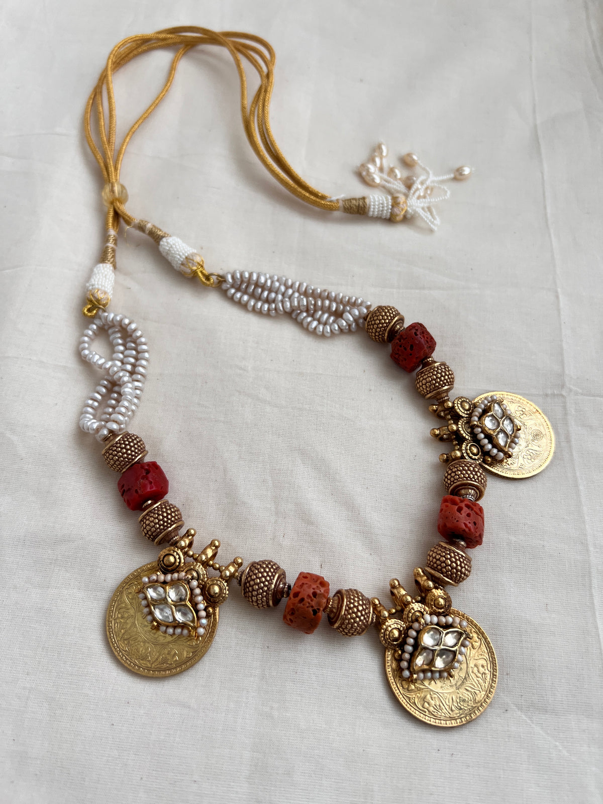 Antique gold polish coral beads with kundan motifs on coin pendant & pearls-Silver Neckpiece-CI-House of Taamara