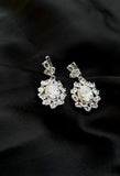 Bright white moissanite earrings with a bg oval stone-Silver earrings-EZ-House of Taamara