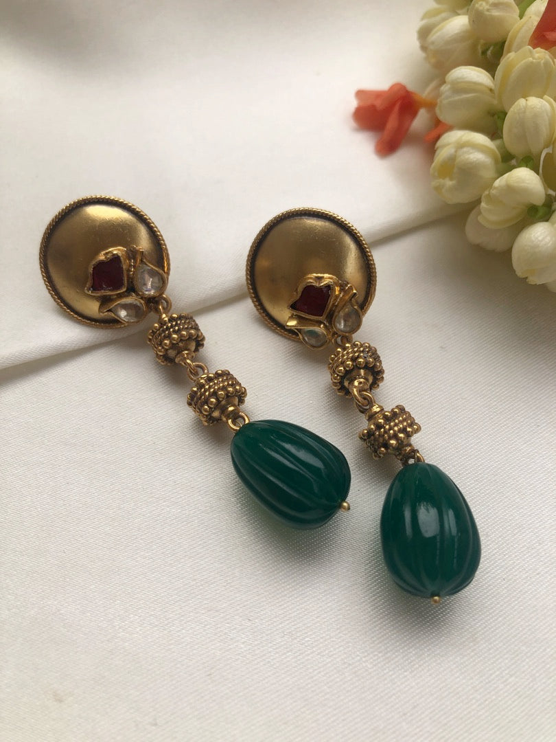 Antique style earrings with green bead drops