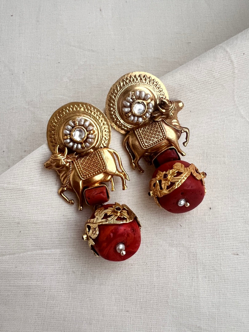 Gold polish cow motif earrings with coral bead hangings-Earrings-CI-House of Taamara