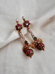 Gold polish kundan, ruby and emerald hangings with pearls