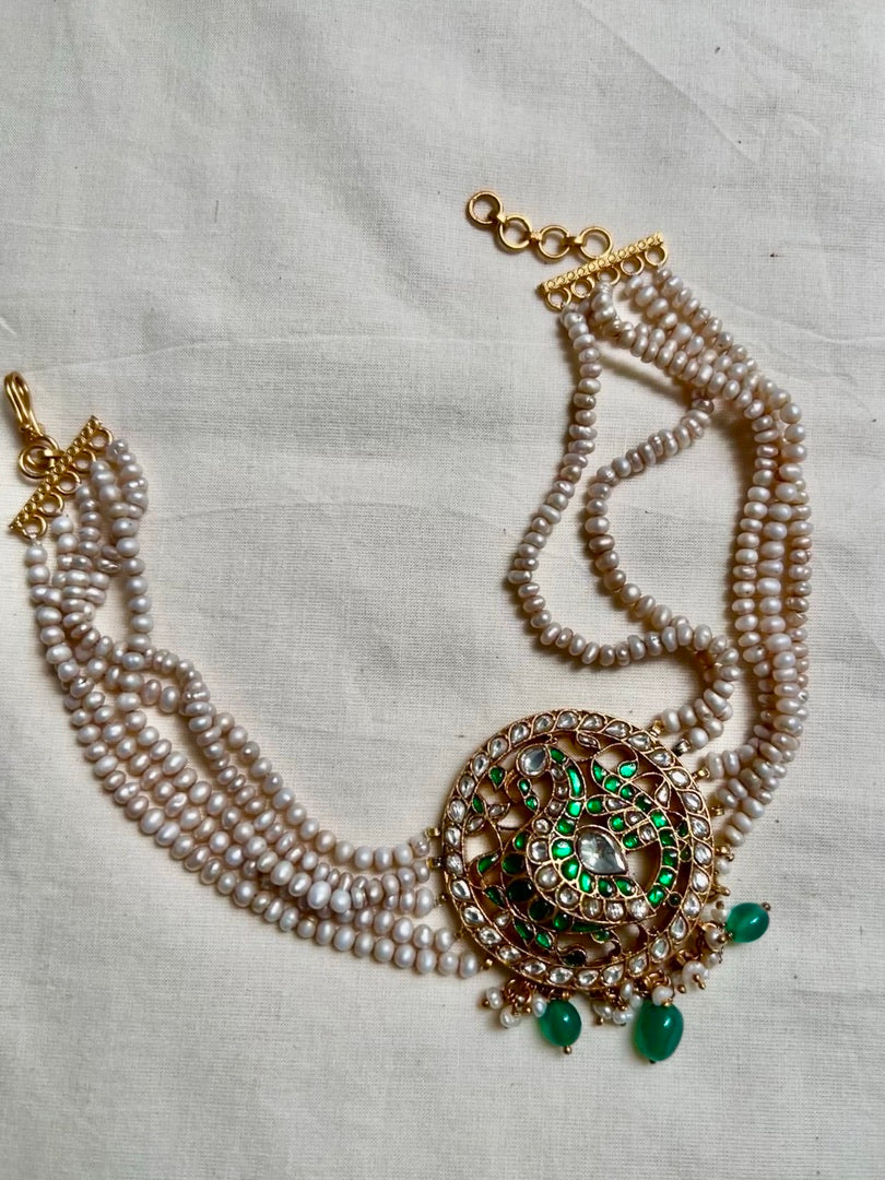 Gold polish kundan & emerald peacock choker with pearl strings and green onyx beads