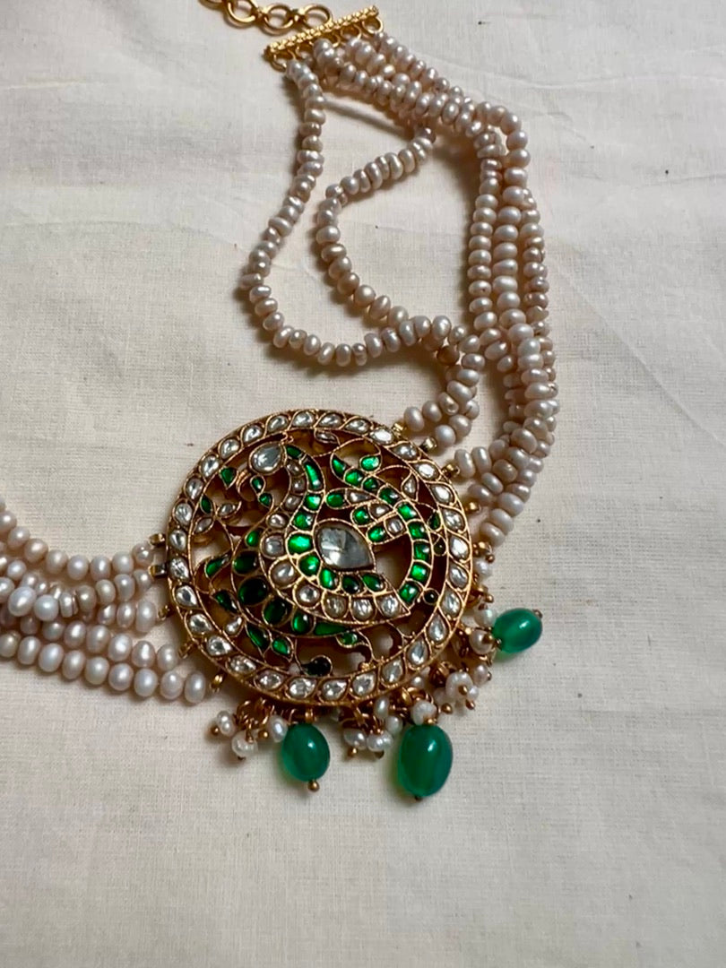 Gold polish kundan & emerald peacock choker with pearl strings and green onyx beads