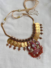 Gold polish kasumala with kundan and ruby gandaberunda pendant