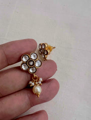 Gold polish kundan flower studs with pearls
