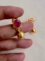 Gold polish ruby studs with gold bead hanging