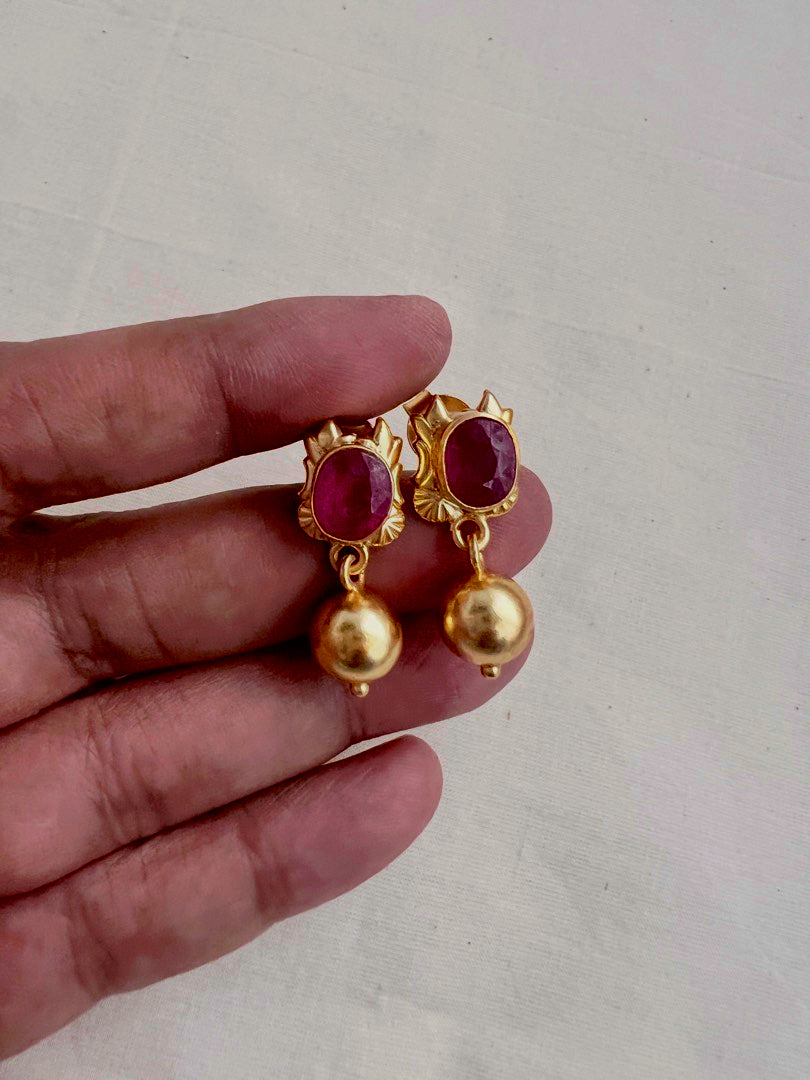 Gold polish ruby studs with gold bead hanging