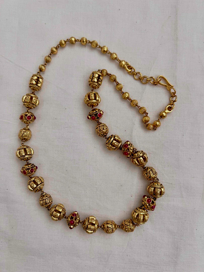 Gold polish ruby stone with nakash work beads chain