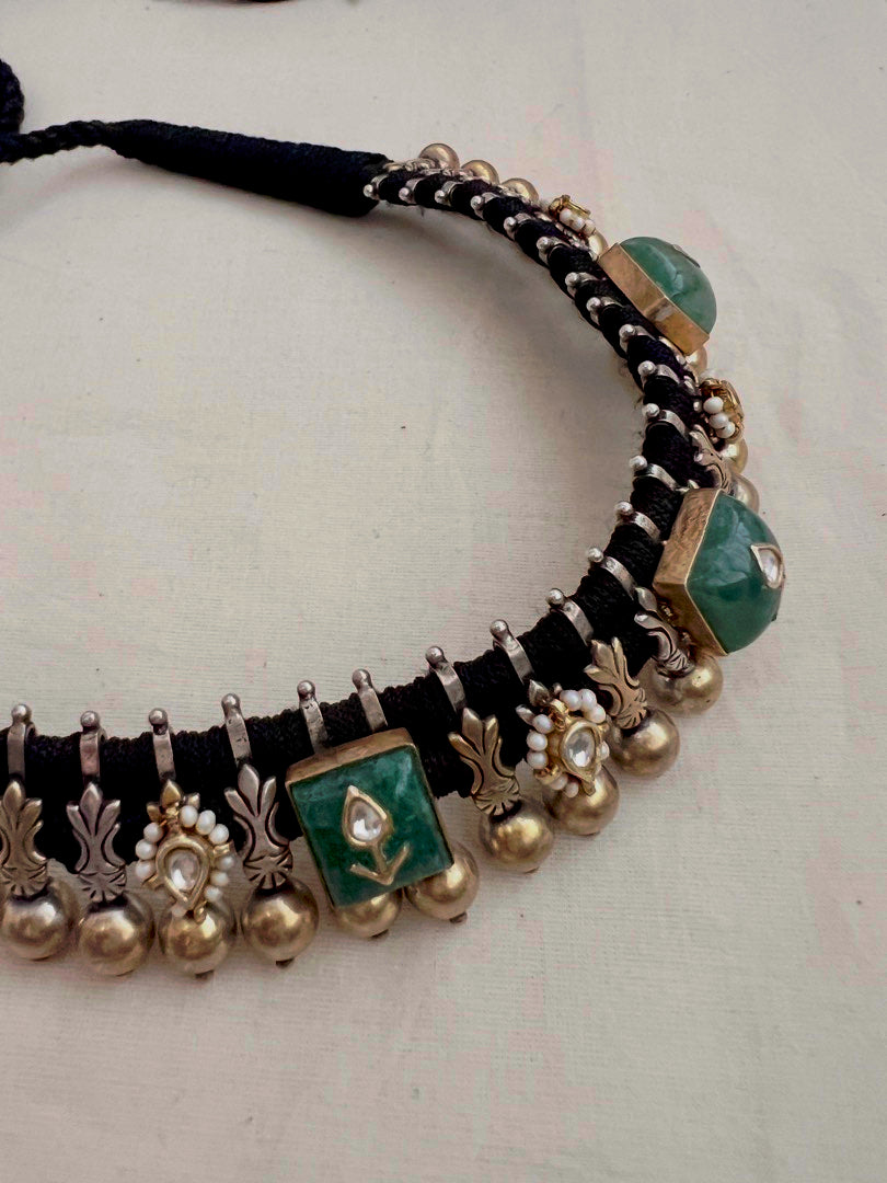 Dual tone kundan inlay work green stone black threaded necklace