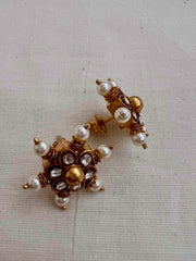 Gold polish kundan studs with pearls