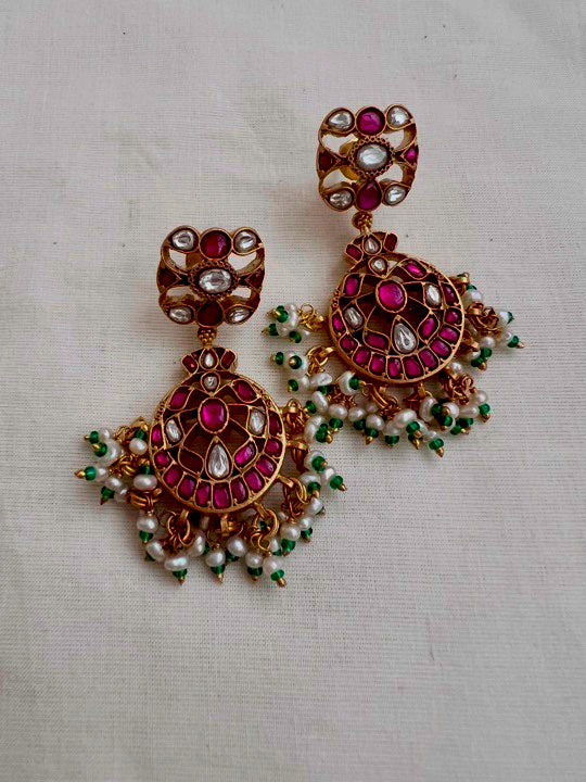 Gold polish kundan, ruby and emerald hangings with pearls