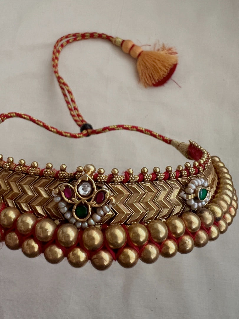 Antique gold polish thussi necklace with jadau motifs