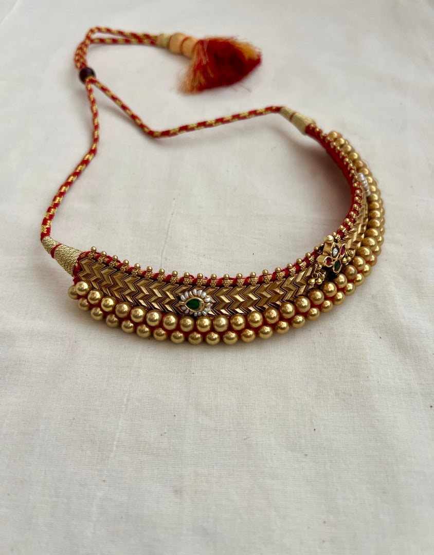 Antique gold polish thussi necklace with jadau motifs