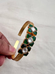 Gold polish kundan and emerald flower kada