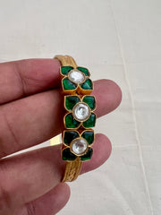Gold polish kundan and emerald flower kada