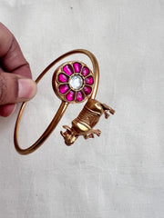 Gold polish kundan & ruby kada with cow motif