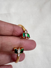 Gold polish kundan and emerald flower kada