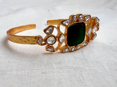 Gold polish kundan and emerald kada