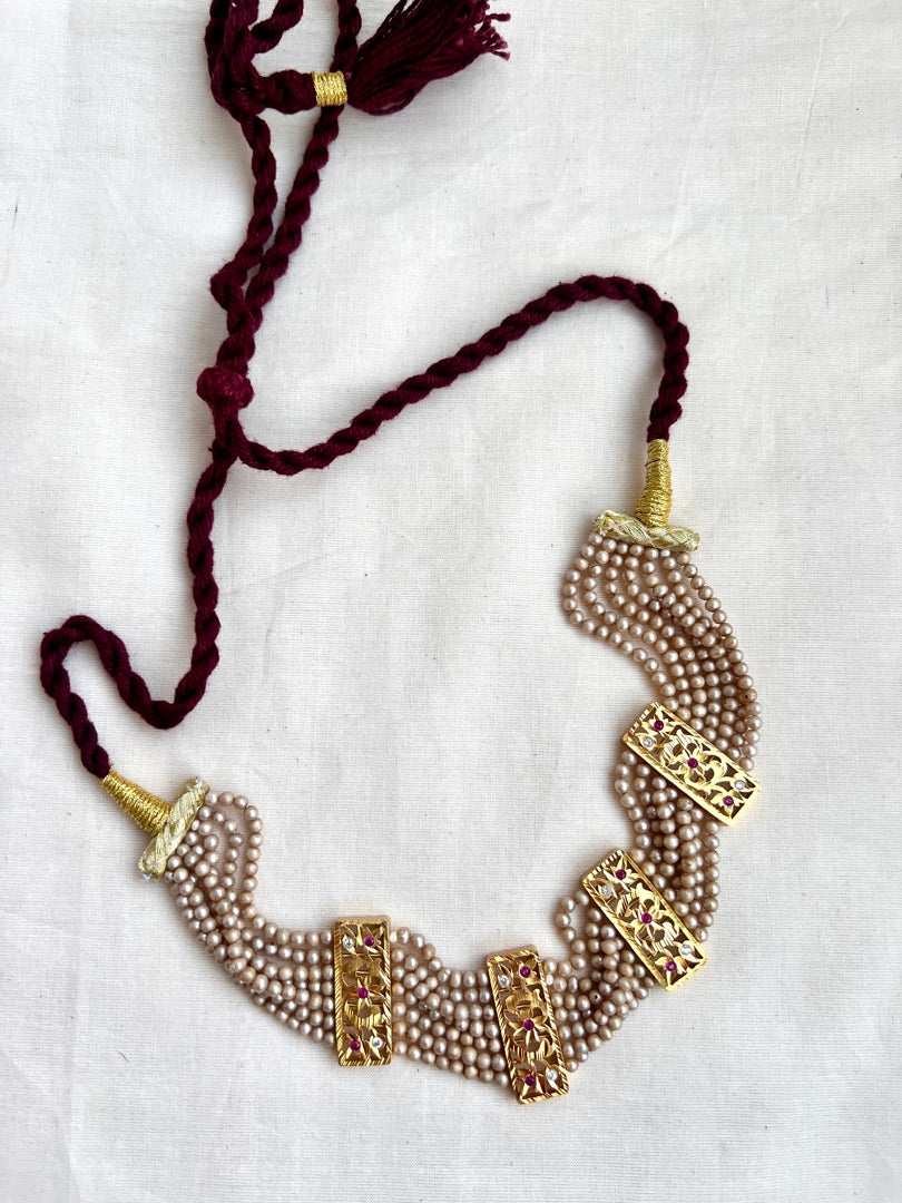 Gold polish stringed pearls choker